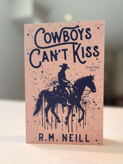 A photo of the cover of the book Cowboys can't kiss.