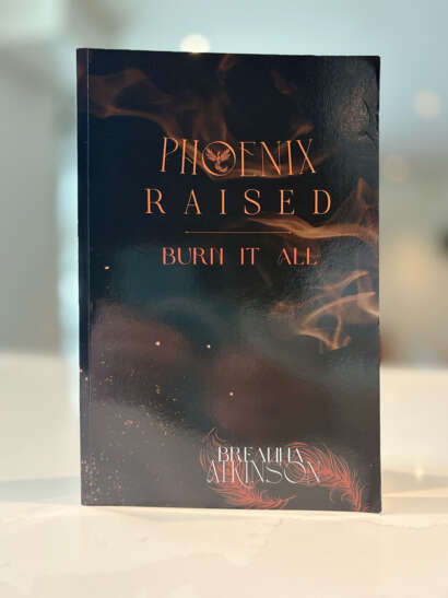 A photo of the cover of the book Phoenix Raised