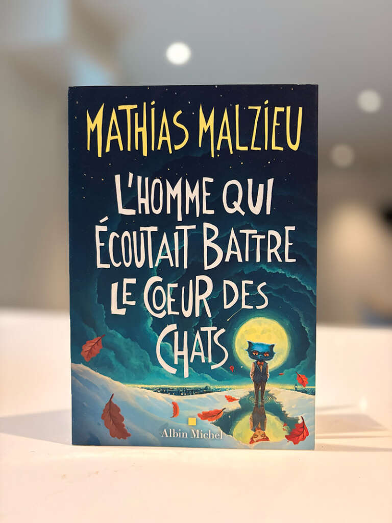 Une photo de la couverture du livre L'homme qui écoutait battre le cœur des chats.
