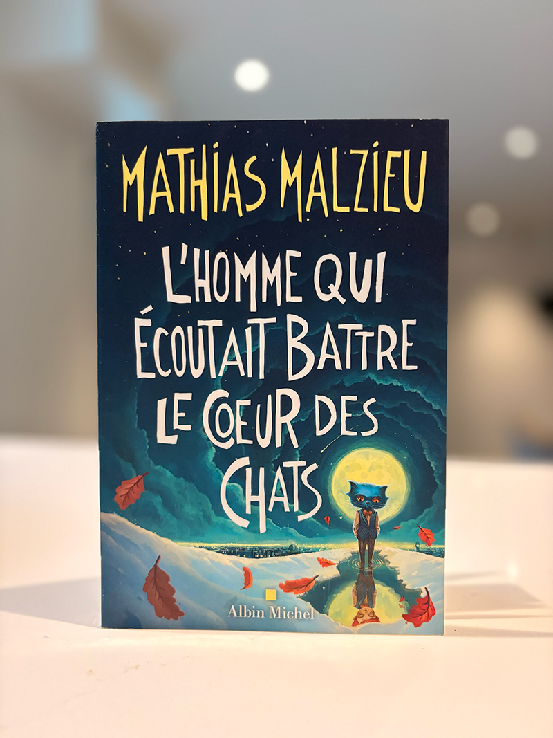 Une photo de la couverture du livre L'homme qui écoutait battre le cœur des chats.